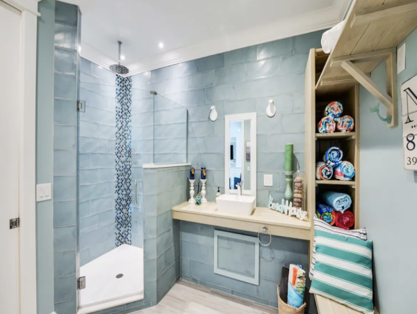 Bathroom w/shower right off pool area.